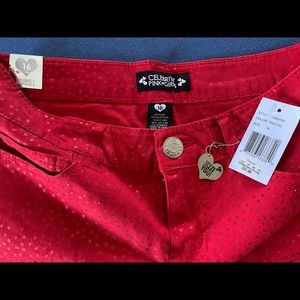Celebrity red pants/jeans with stars